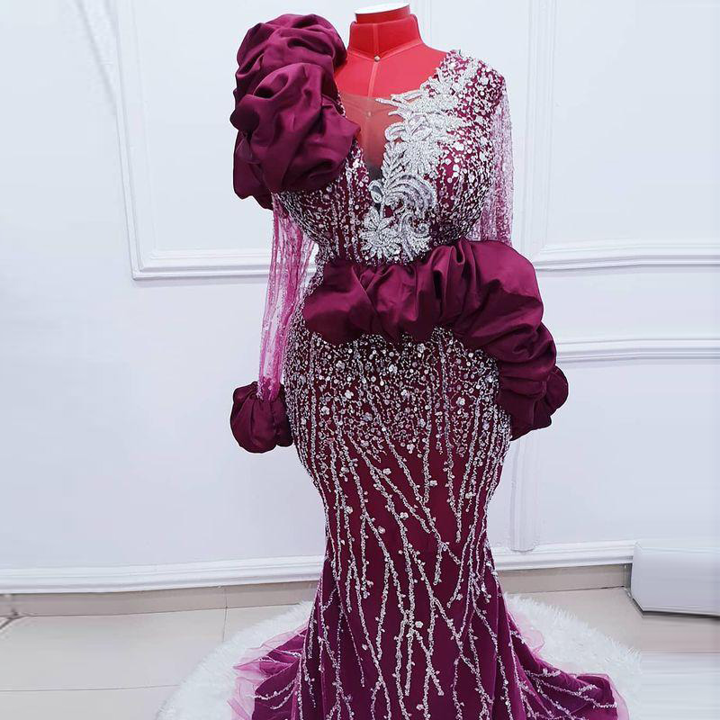 Grape African Mermaid Evening Dresses Sheer Neck Ruffles Sexy Prom Dress Long Sleeves Beads Lace Appliques Aso Ebi Party Gown Grape African Mermaid Evening Dresses Sheer Neck Ruffles Sexy Prom Dress Long Sleeves Beads Lace Appliques Aso Ebi Party Gown